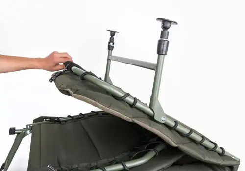 Fox Warrior 6 Leg Bedchair Being Folded